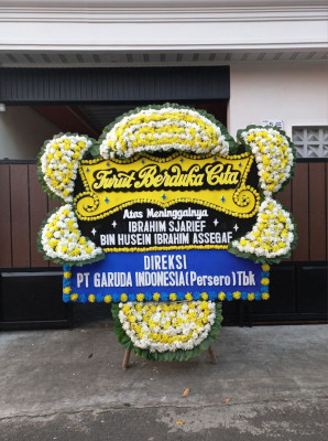 Papan Bunga Duka di Trimurti